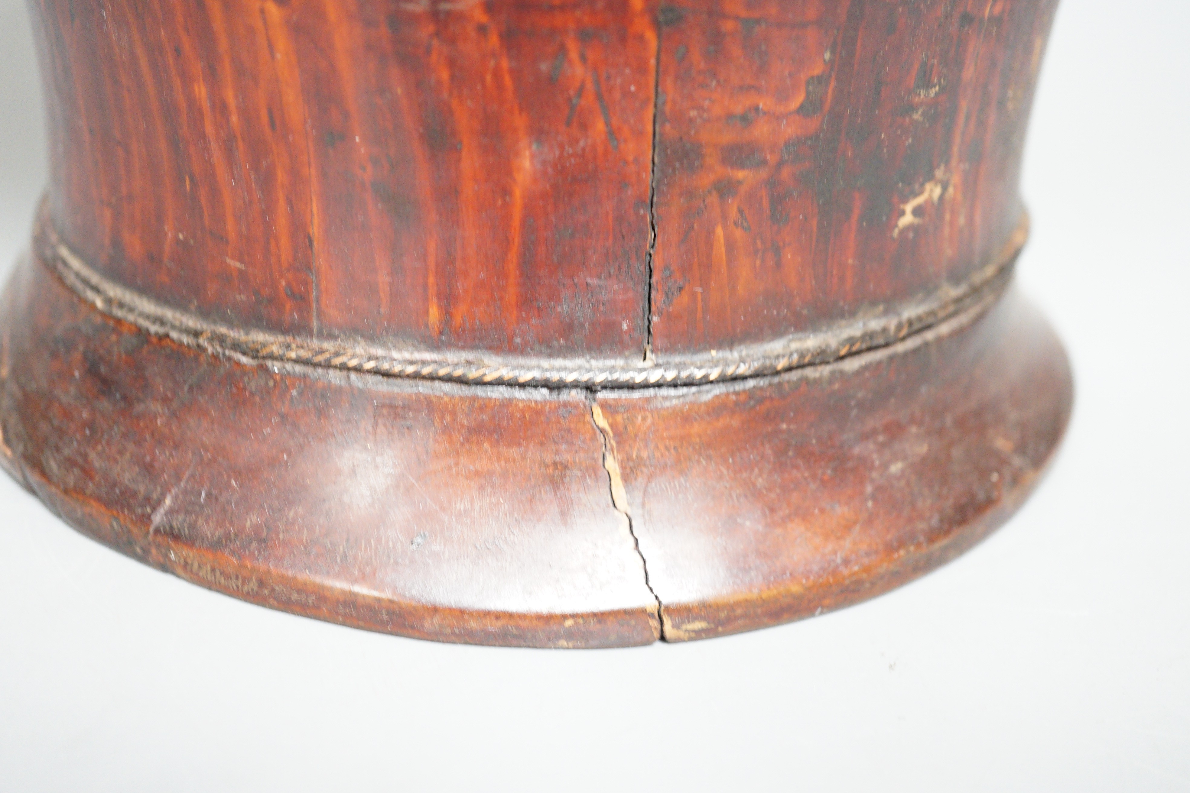 A Chinese carved wood jar and cover, 33cm